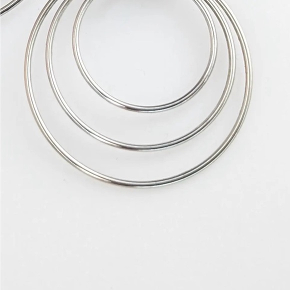 Elegant Triple Circle Silver Clip On Earrings - Picture 3 of 3